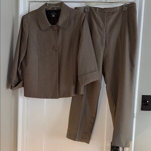 Elegant Brown Pantsuit for Women may be vintage.